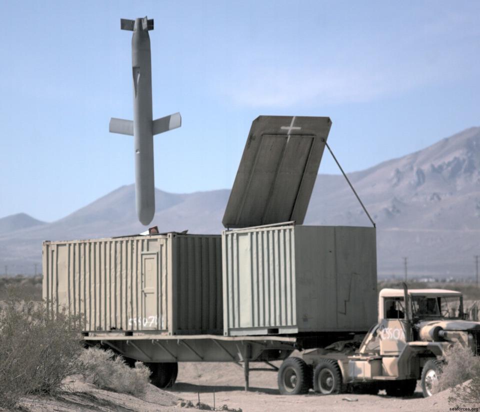 A Tomahawk about to destroy a mock radar site on the China Lake range. (USN)