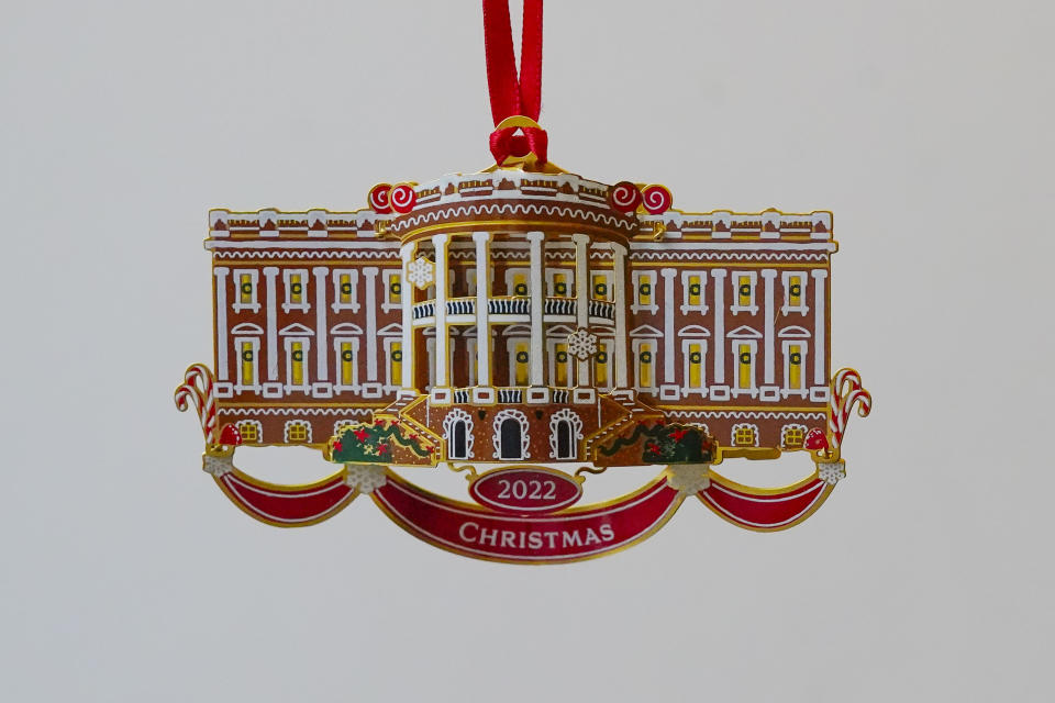 The White House Historical Association's 2022 Christmas Ornament, Tuesday, Dec 6, 2022 in Washington. The annual tree ornament is honors President Richard M. Nixon's administration and a nod to first lady Pat Nixon who first put a gingerbread house on display in the State Dining Room for the holiday season at the White House, long before its talented pastry chefs began making hundred-pound replicas of the executive mansion. (AP Photo/Pablo Martinez Monsivais)