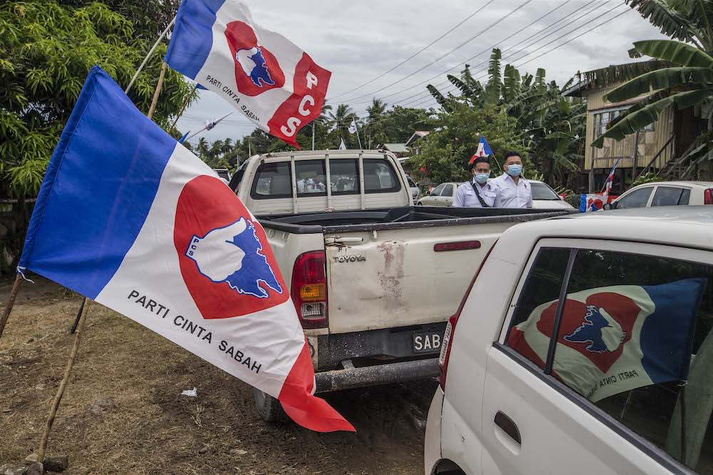 Parti Cinta Sabah (PCS) flags are seen in Kota Belud, Sabah September 20, 2020. — Picture by Firdaus Latif