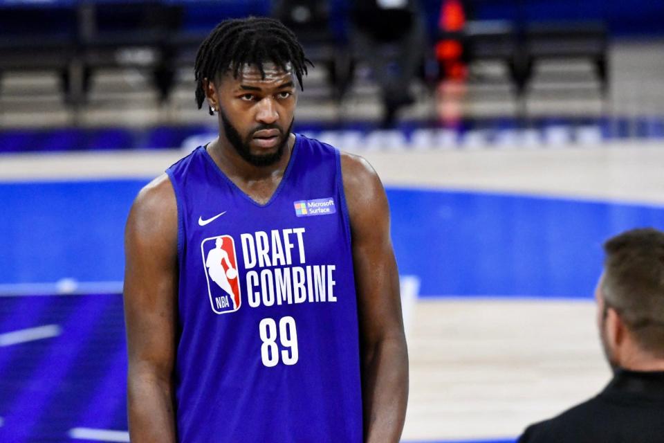 Purdue star Trevion Williams listens to instructions for an agility drill during the NBA Draft Combine at Wintrust Arena in Chicago on May 18, 2022.