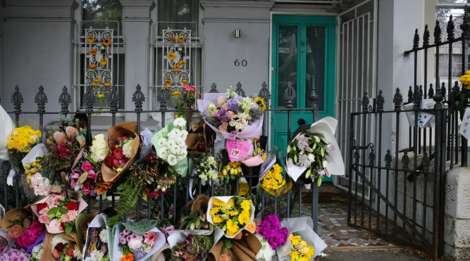 Flowers seen outside Jesse Baird's Paddington address.