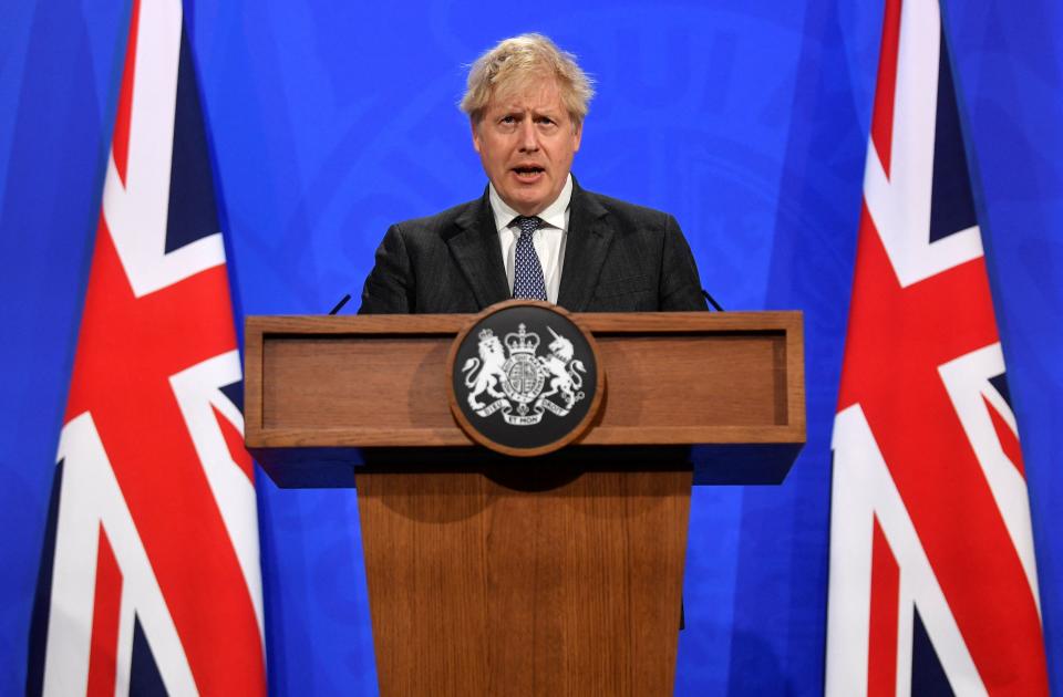 Britain's Prime Minister Boris Johnson gives an update on the coronavirus Covid-19 pandemic during a virtual press conference inside the new Downing Street Briefing Room in central London on April 20, 2021. - Britain on Monday imposed its strictest travel curbs on India after an explosion of coronavirus cases there, hours after Prime Minister Boris Johnson called off a trip to New Delhi. (Photo by TOBY MELVILLE / POOL / AFP) (Photo by TOBY MELVILLE/POOL/AFP via Getty Images)