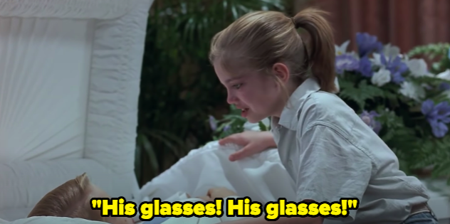 A young girl screams "His glasses! His glasses!"