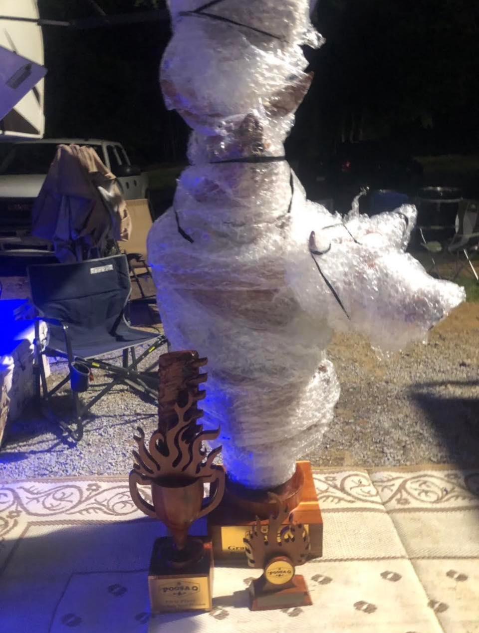 Tim Evans' 2019 Backyard Grand Champion trophy is covered in bubble wrap to protect the chainsaw carving during its trip from 'Poosa Q in Montgomery to Evans' home in Huntsville.