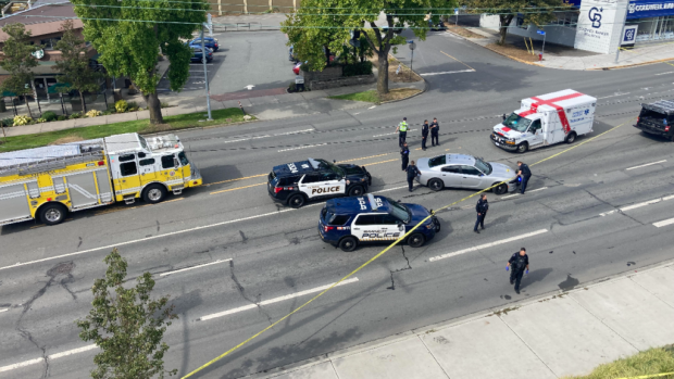 Emergency responders at Douglas Street and Tolmie Avenue in Victoria where a man was shot and killed by police on Sunday Sept. 12, 2021. (CHEK News - image credit)