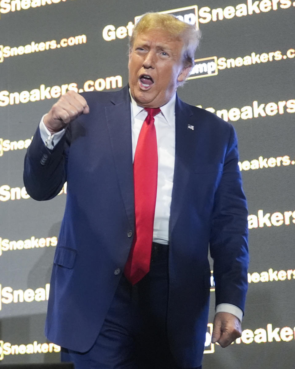 Republican presidential candidate former President Donald Trump gestures to the crowd at Sneaker Con Philadelphia, an event popular among sneaker collectors, in Philadelphia, Saturday, Feb. 17, 2024. (AP Photo/Manuel Balce Ceneta)