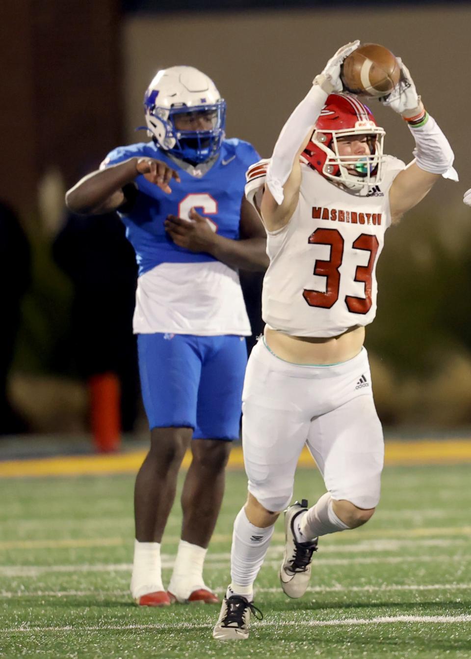 Washington's Cooper Alexander celebrates a fumble recovery in the second half of the Class 2A high school football championship game between Millwood and Washington at Chad Richison Stadium in Edmond, Okla., Saturday, Dec. 9, 2023.