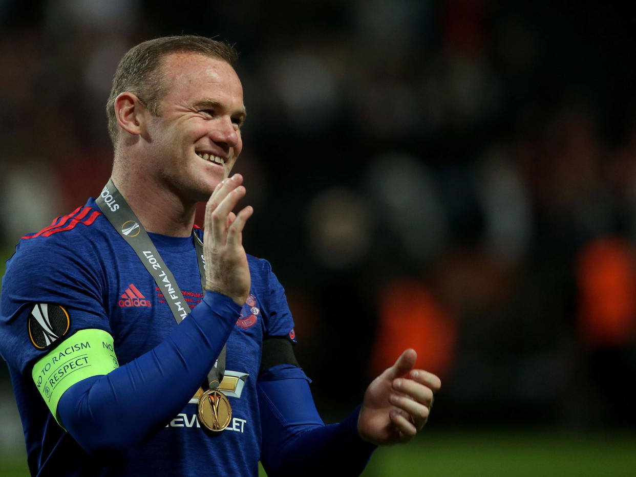 Wayne Rooney celebrates after Wednesday's victory: Getty