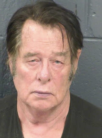 Larry Mitchell Hopkins appears in a police booking photo taken at the Dona Ana County Detention Center in Las Cruces, New Mexico, U.S., April 20, 2019. Dona Ana County Detention Center/Handout via REUTERS