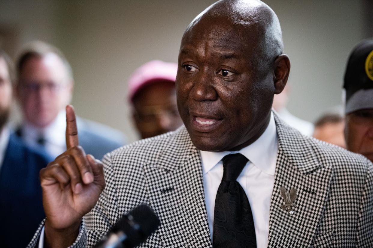 Defense attorney Ben Crump speaks at a press conference advocating for the charges against Marsha Ervin, right, to be dropped Tuesday, Oct. 10, 2023. Ervin was arrested at 3 a.m. for alleged voter fraud in late September.