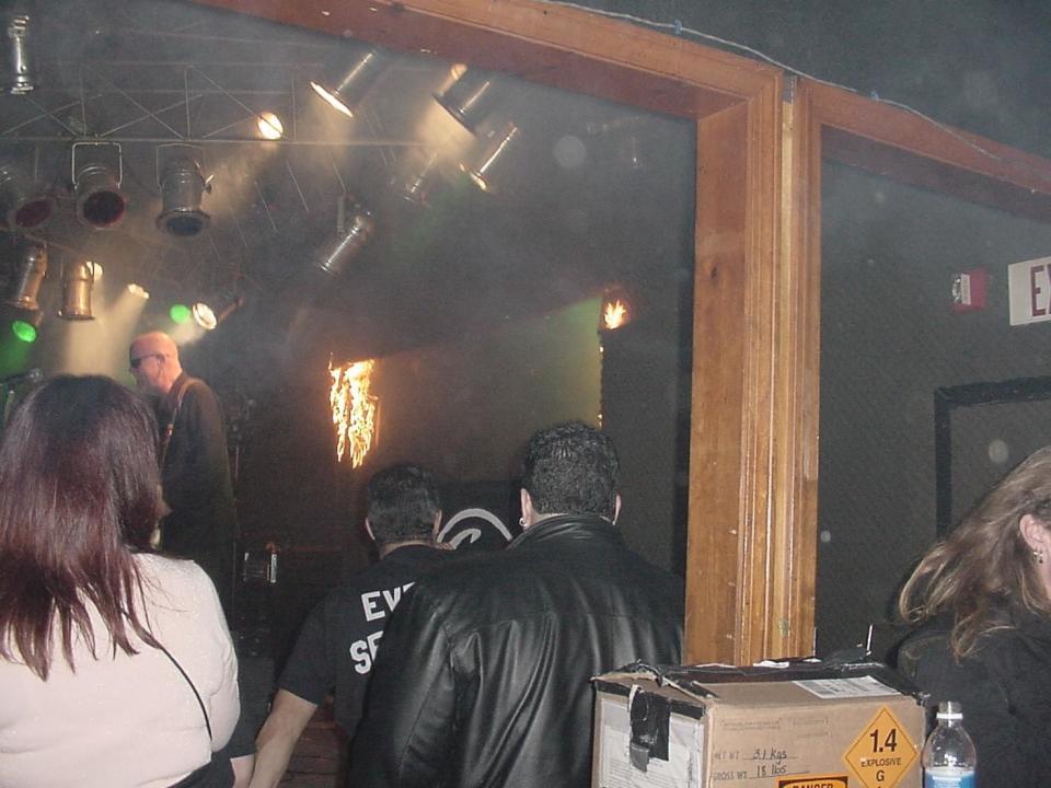 It all started around 11 p.m. when the rock band Jack Russell's Great White took the stage and the group's tour manager, Daniel Biechele, set off four large fireworks called gerbs. Flames can be seen on the back wall. / Credit: Dan Davidson