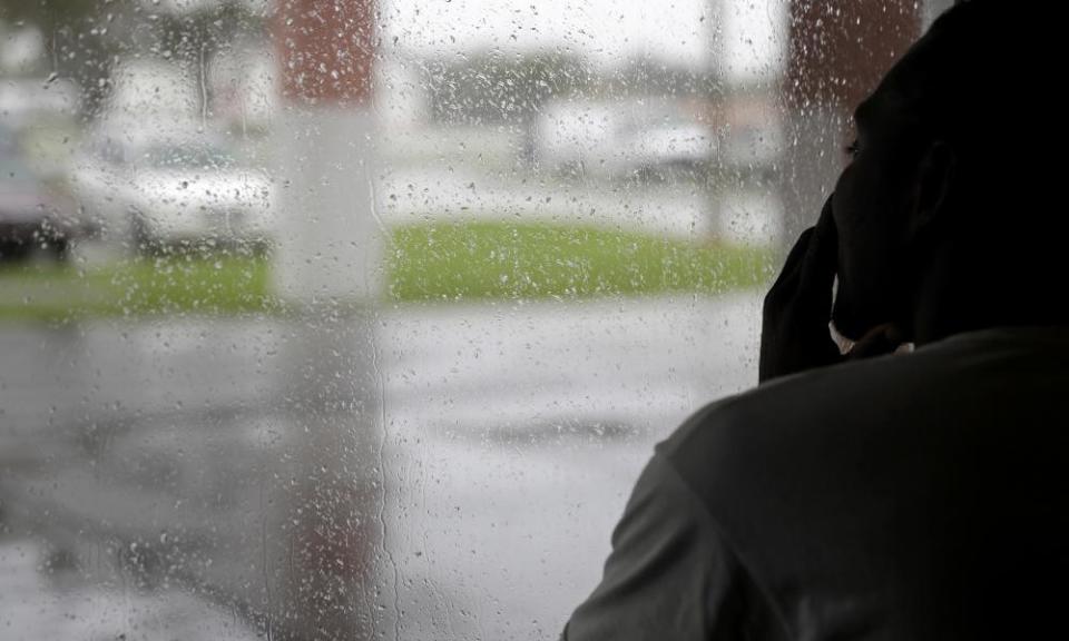 An evacuee watches the weather from inside a shelter as Hurricane Irma approaches in Naples, Florida Sunday.