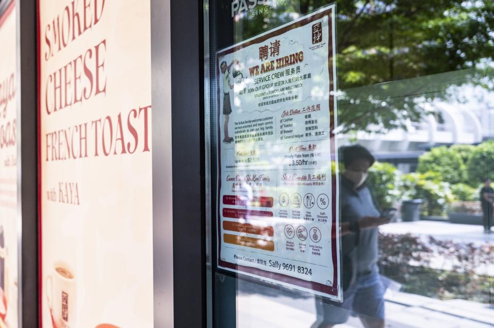 A recruitment poster in the window of an eatery in Singapore.