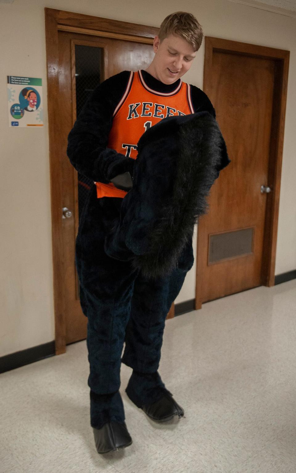 The Keefe Tech mascot, Billy the Bronco, senior TJ Nickerson, gets ready for the basketball home opener, Dec. 14, 2023.