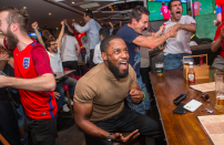 <p>A group of England fans in Mooch Bar in Birmingham express their joy after Harry Kane’s late winner against Tunisia.<br> (Picture: SWNS) </p>