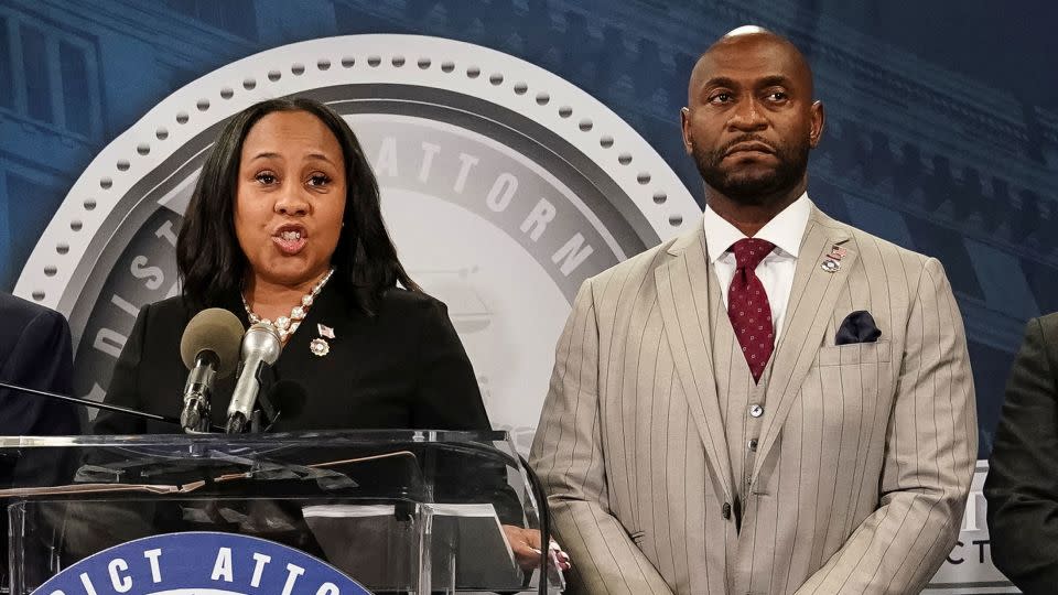 Fulton County District Attorney Fani Willis speaks at a press conference next to prosecutor Nathan Wade after a Grand Jury brought back indictments against former president Donald Trump and his allies in their attempt to overturn the state's 2020 election results, in Atlanta, Georgia, on August 14, 2023. - Elijah Nouvelage/Reuters/File