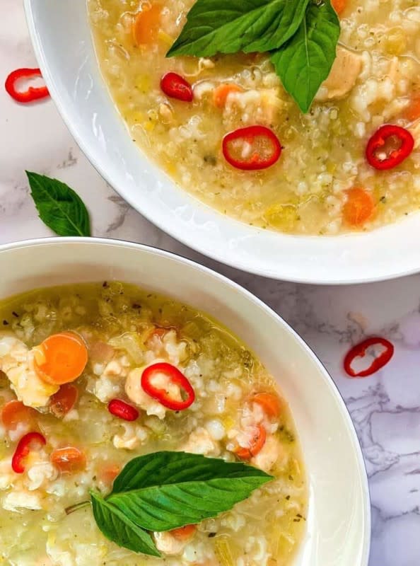 <p>The Kitchen Division</p><p>Nourishing, warming and easy to digest, this chicken and leek congee is perfect for a cold day and a great way to nourish yourself when you have a sensitive stomach.</p><p><strong>Get the recipe: <a href="https://thekitchendivision.com/chicken-and-leek-congee/" rel="nofollow noopener" target="_blank" data-ylk="slk:Chicken and Leek Congee;elm:context_link;itc:0;sec:content-canvas" class="link rapid-noclick-resp"><em>Chicken and Leek Congee</em></a></strong></p>