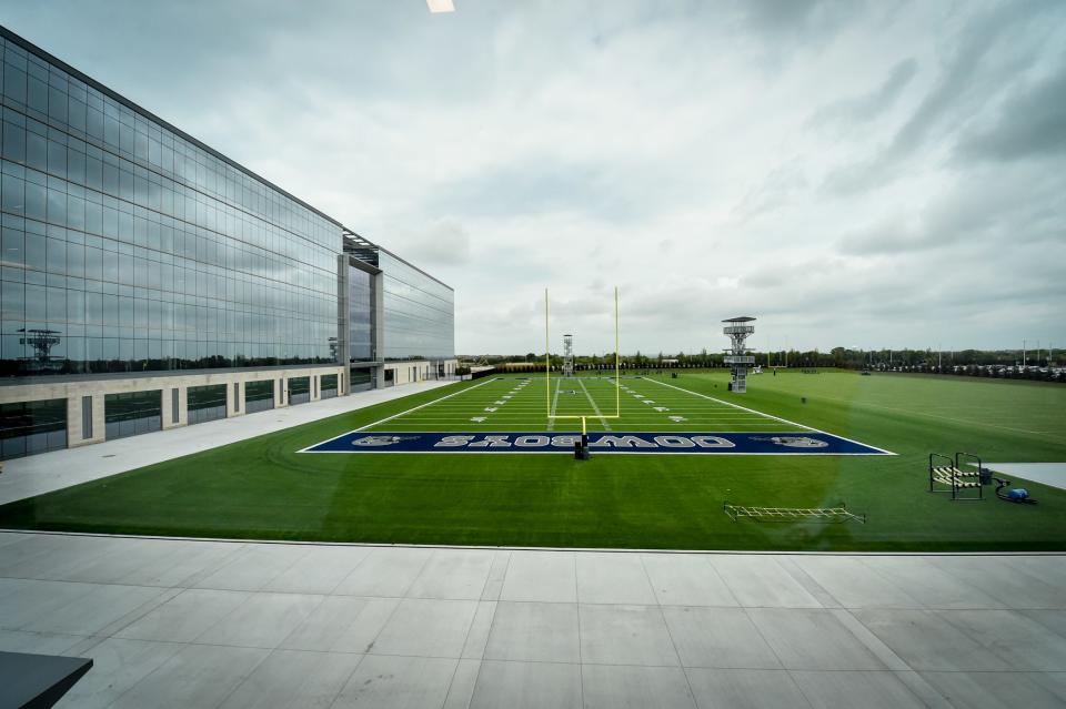 One of two outdoor practice fields. The building on the left, designed by Gensler, comprises the Cowboys' corporate offices, including those of the Jones family.