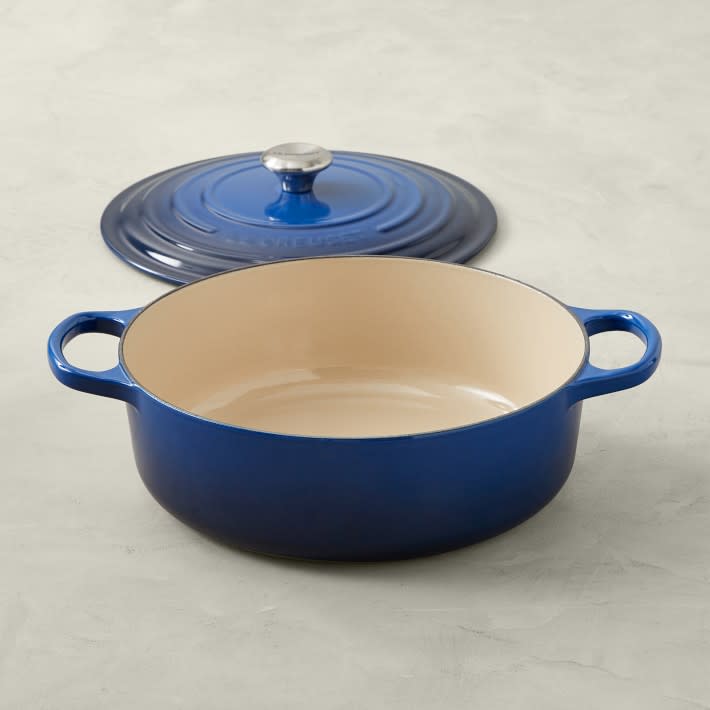 <p><a href="https://go.redirectingat.com?id=74968X1596630&url=https%3A%2F%2Fwww.williams-sonoma.com%2Fproducts%2Fle-creuset-signature-round-wide-dutch-oven&sref=https%3A%2F%2Fwww.townandcountrymag.com%2Fstyle%2Fg44834012%2Fbest-practical-gifts%2F" rel="nofollow noopener" target="_blank" data-ylk="slk:Shop Now;elm:context_link;itc:0;sec:content-canvas" class="link rapid-noclick-resp">Shop Now</a></p><p>Signature Enameled Cast Iron Round Wide Dutch Oven</p><p>williams-sonoma.com</p><p>$249.99</p>