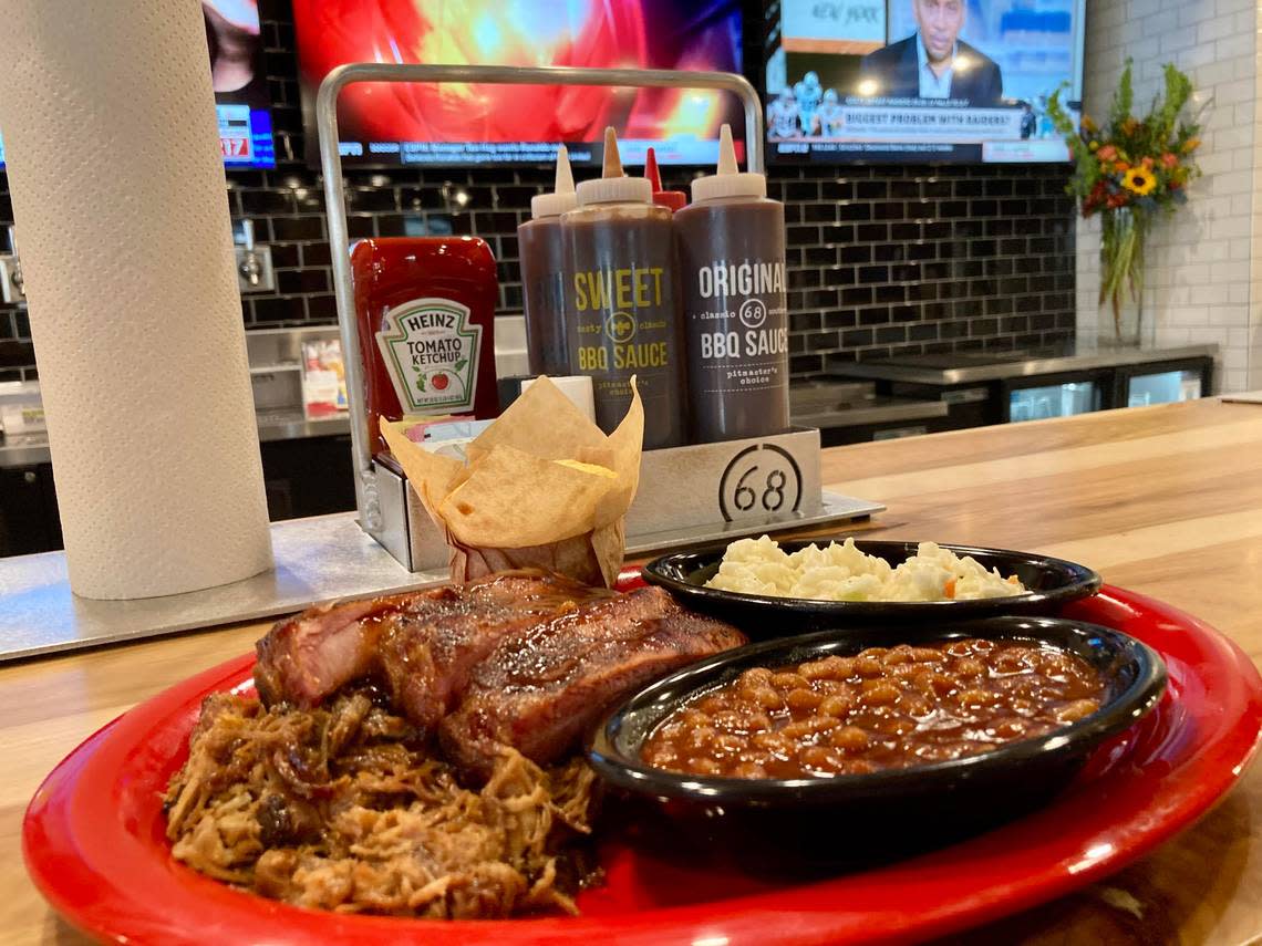 A pick two at Sonny’s BBQ of pulled pork, sweet and smokey ribs, BBQ beans, coleslaw and cornbread. Becky Purser/The Telegraph