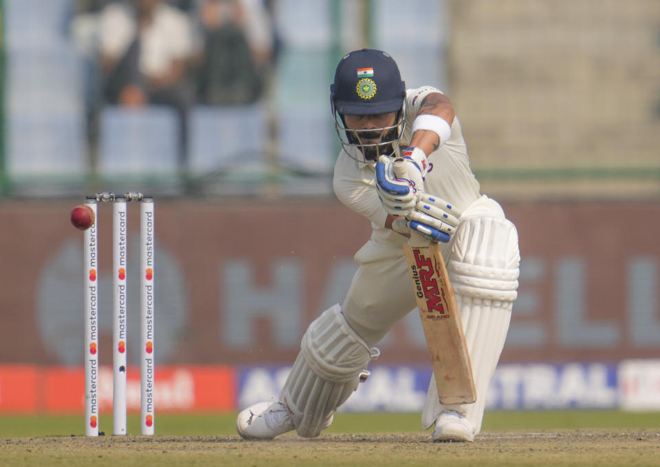 India's Virat Kohli plays a shot during the second day of the second cricket test match between India and Australia in New Delhi, India, Saturday, Feb. 18, 2023. (AP Photo/Altaf Qadri)