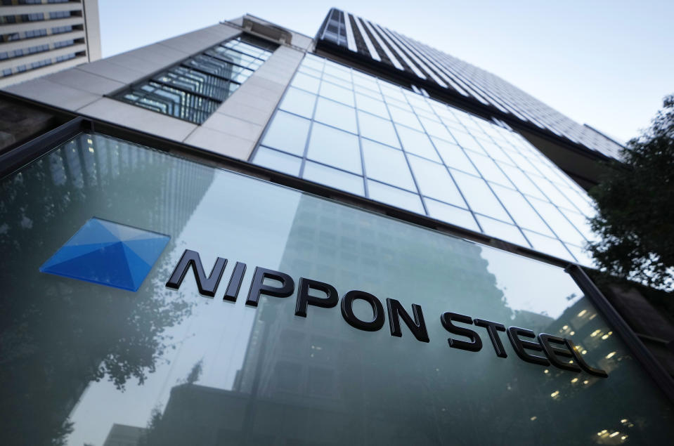 FILE - Nippon Steel Corporation's logo is displayed on a sign outside its headquarters in Tokyo on Nov. 26, 2021. U.S. Steel is being acquired by Nippon Steel in an all-cash deal valued at approximately $14.1 billion. (AP Photo/Hiro Komae, File)