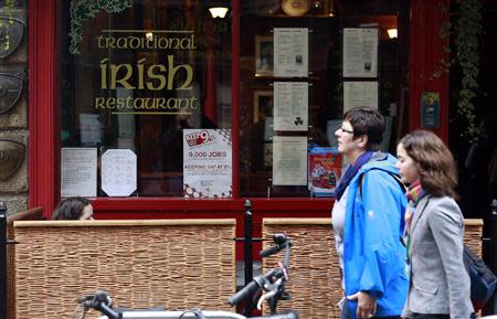 A campaign poster calling for the retention of the 9% VAT rate for the hospitality sector is displayed in a Dublin city centre restaurant ahead of Ireland's budget later this month, October 4, 2013. REUTERS/Cathal McNaughton