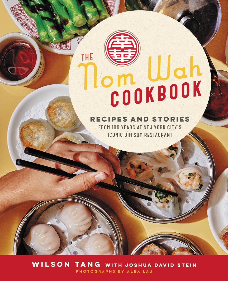 This cover image released by Ecco shows “The Nom Wah Cookbook: Recipes and Stories from 100 Years at New York City's Iconic Dim Sum Restaurant," by Wilson Tang with Joshua David Stein. (Ecco via AP)