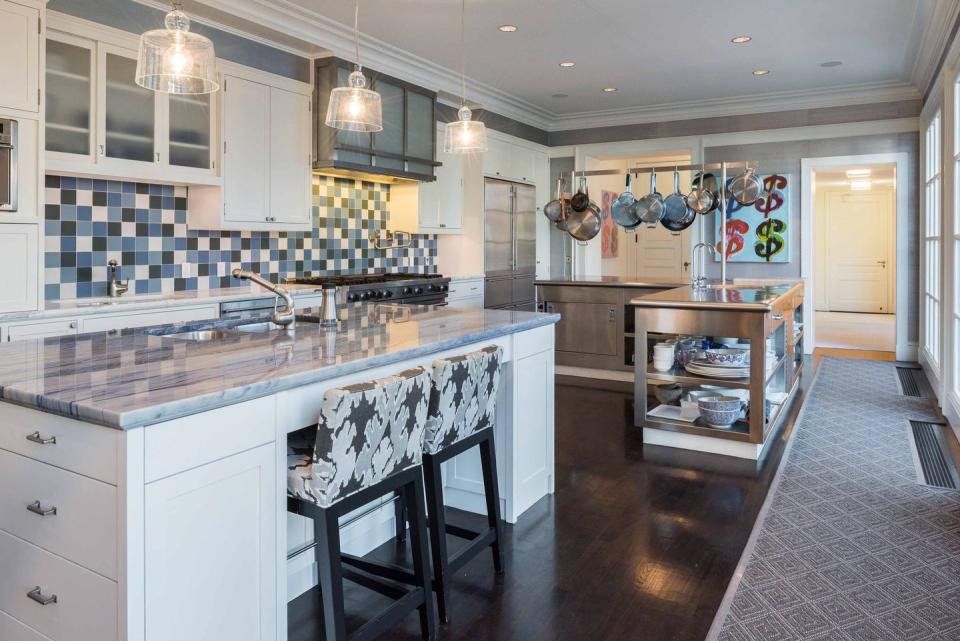 The gourmet kitchen opens up to the family room.