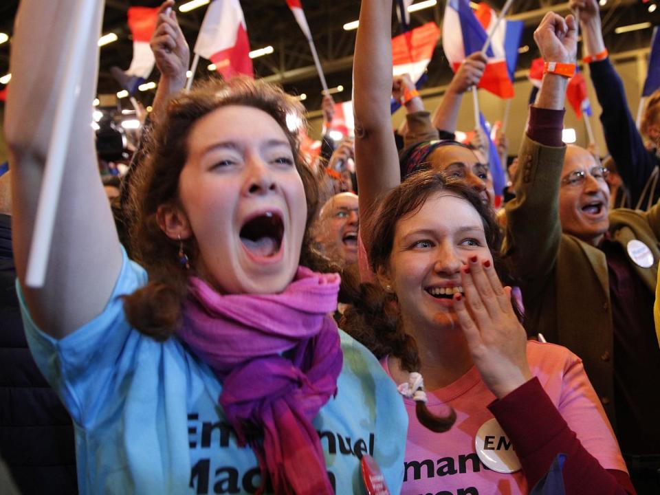 Macron supporters celebrating the results (AP)