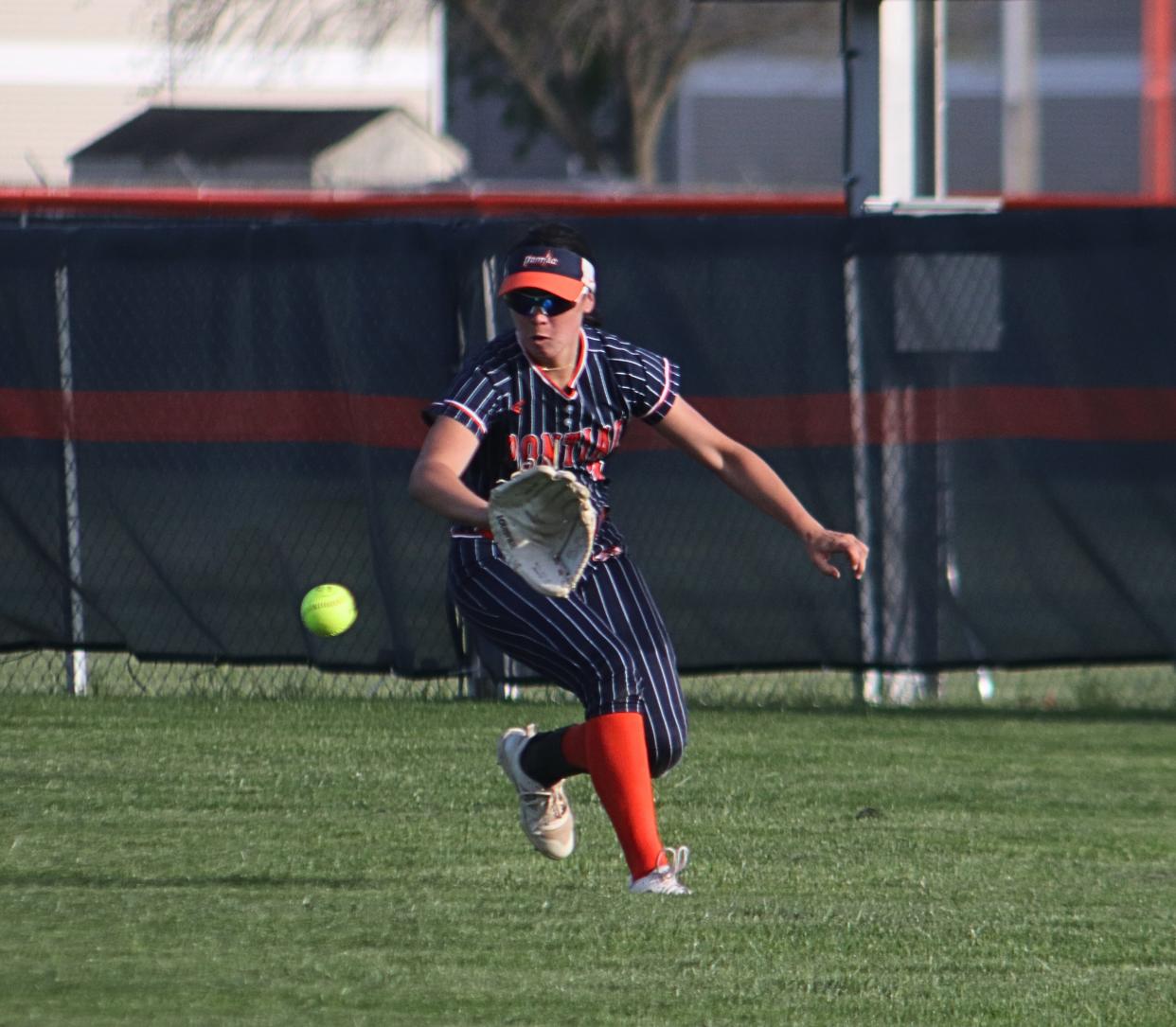 Pontiac center fielder Maddie Gourley tracks down the ball during Thursday's softball win over Prairie Central.