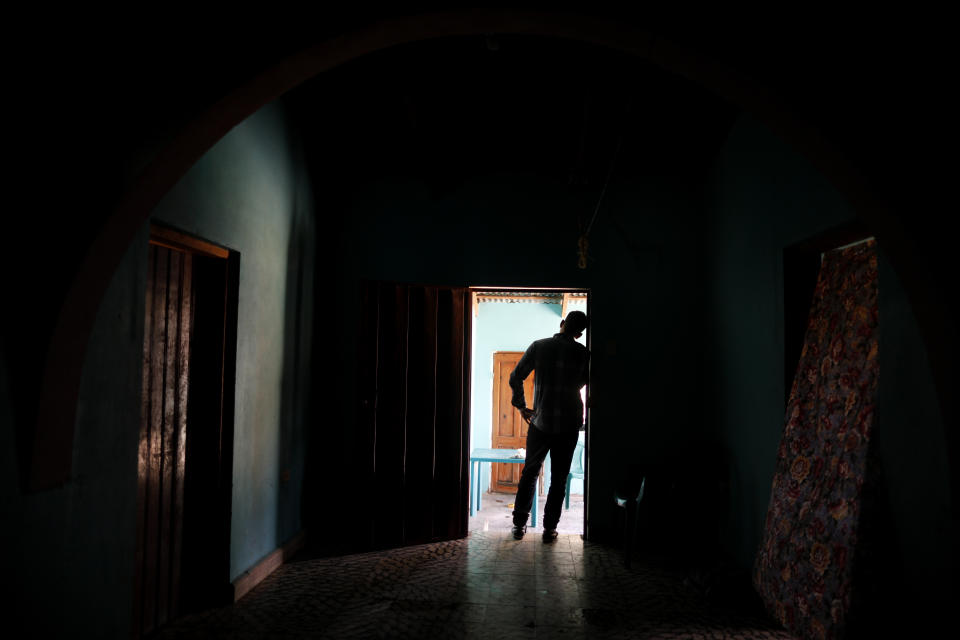 In this Aug. 23, 2019, photo, a Honduran father stands at his home in Comayagua, Honduras, after talking in an interview about being separated from his 3-year-old daughter at the border after traveling for weeks to seek asylum in the U.S. According to court records, his daughter was sexually abused in U.S. foster care. She was later deported and arrived back in Honduras withdrawn, anxious and angry. He fears their bond is forever broken. (AP Photo/Elmer Martinez)