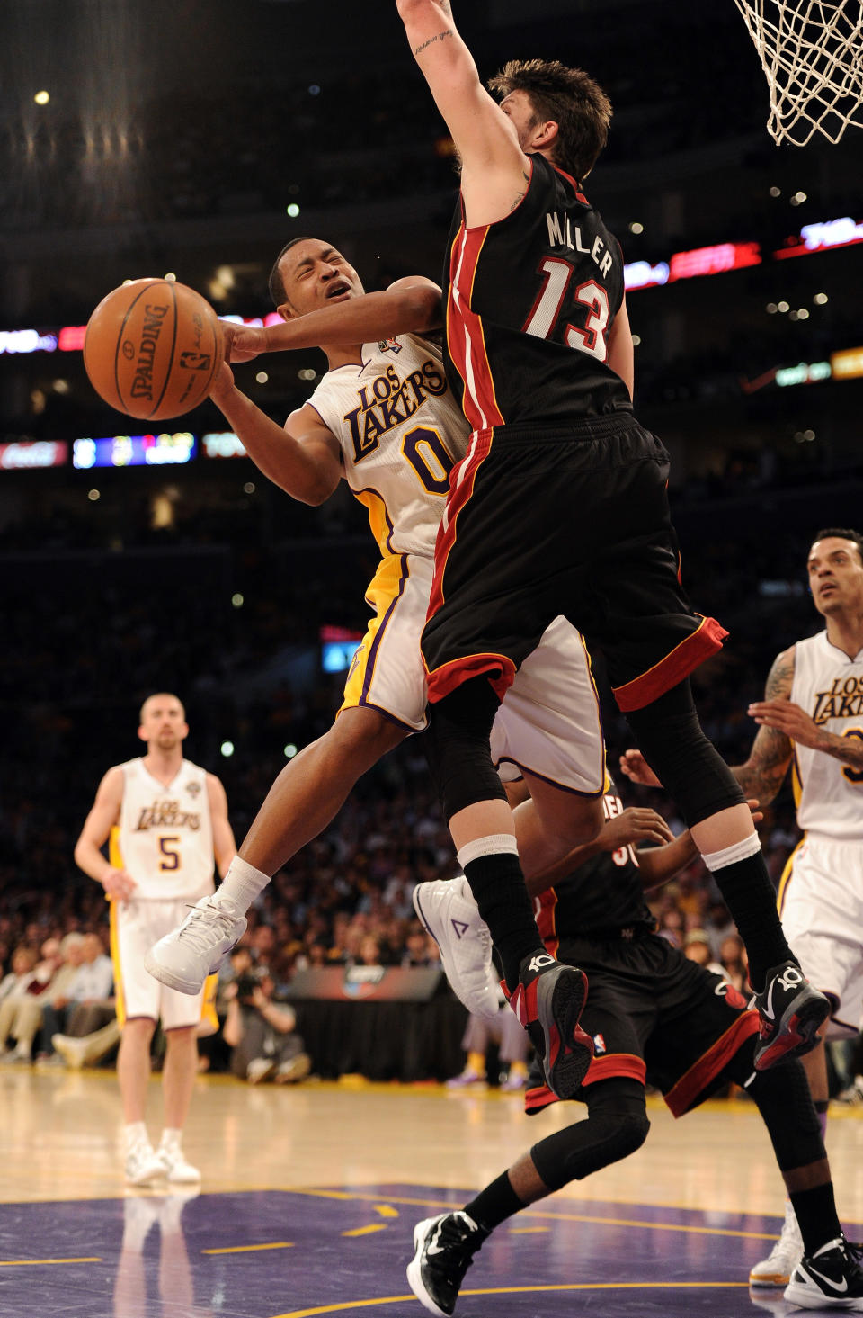 LOS ANGELES, CA - MARCH 04: Andrew Goudelock #0 of the Los Angeles Lakers has his shot blocked by Mike Miller #13 of the Miami Heat during the game at Staples Center on March 4, 2012 in Los Angeles, California. NOTE TO USER: User expressly acknowledges and agrees that, by downloading and or using this photograph, User is consenting to the terms and conditions of the Getty Images License Agreement. (Photo by Harry How/Getty Images)