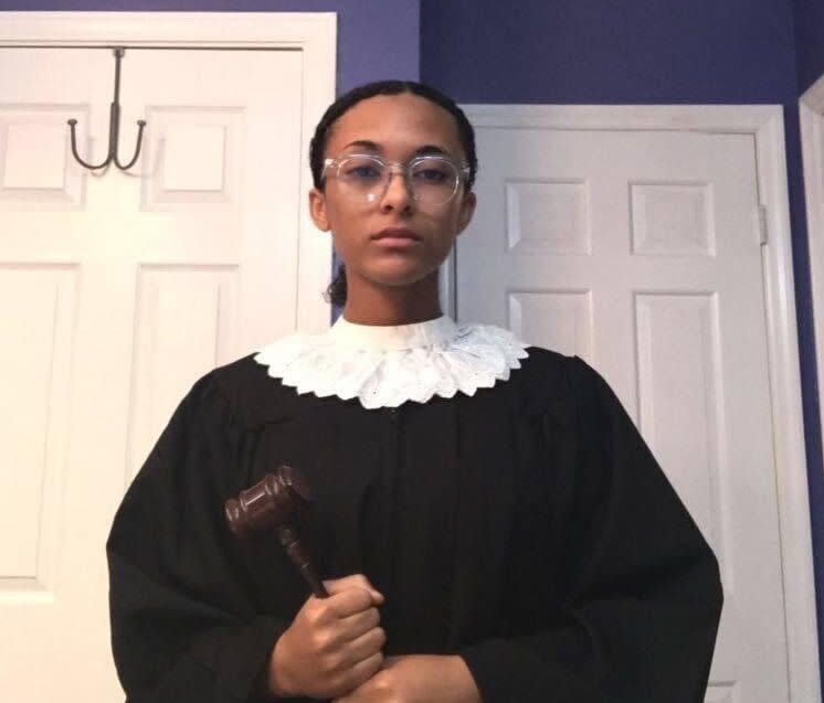 Leyla Fern King dresses up as Justice Ruth Bader Ginsburg, complete with a white collar and gavel. (Photo: Photo courtesy of Leyla Fern King)