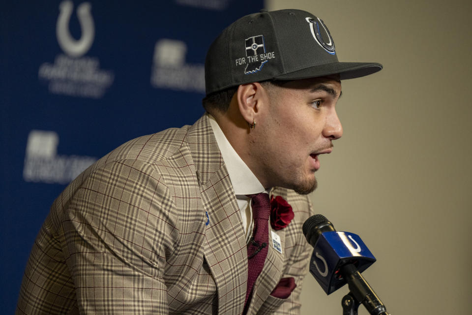 Indianapolis Colts first round draft pick Laiatu Latu speaks at an NFL football news conference in Indianapolis, Friday, April 26, 2024. (AP Photo/Doug McSchooler)