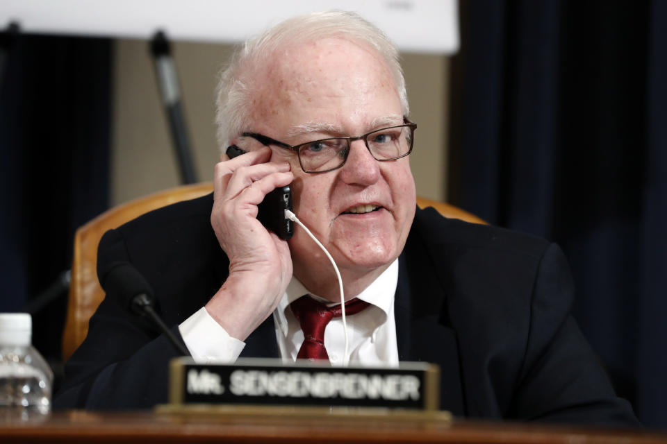 Rep. Jim Sensenbrenner, R-Wis., talks on the phone during a break in a hearing before the House Judiciary Committee on the constitutional grounds for the impeachment of President Donald Trump, Wednesday, Dec. 4, 2019, on Capitol Hill in Washington. (AP Photo/Jacquelyn Martin)