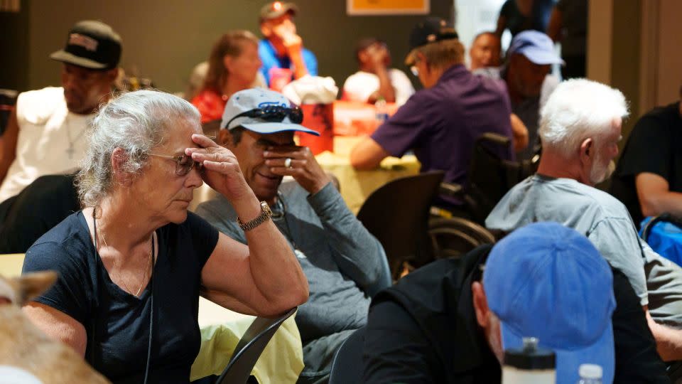 K.C. Griffin sits in a crowded room at Justa Center, one of the Valley's many cooling centers, during a heat wave in Phoenix, Arizona, July 16, 2023.  - Megan Mendoza/USA Today Network/Reuters