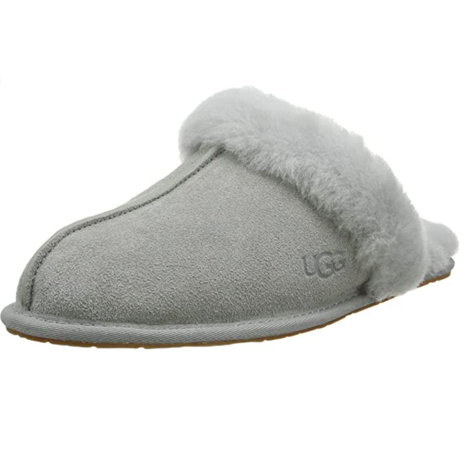 <p><strong>UGG</strong></p><p>amazon.com</p><p><strong>$69.97</strong></p><p><a href="https://www.amazon.com/dp/B001IIKP44?tag=syn-yahoo-20&ascsubtag=%5Bartid%7C10052.g.40436867%5Bsrc%7Cyahoo-us" rel="nofollow noopener" target="_blank" data-ylk="slk:Shop Now;elm:context_link;itc:0;sec:content-canvas" class="link ">Shop Now</a></p><p>Can't think of a single person who <em>wouldn't</em> appreciate a fluffy pair of slippers. </p>