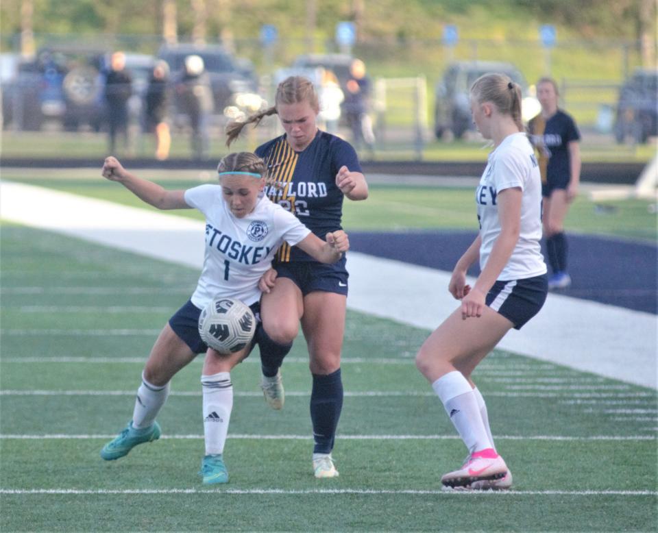 Claire Gorno fights for possession during a high school soccer matchup between Gaylord and Petoskey on Tuesday, May 16.