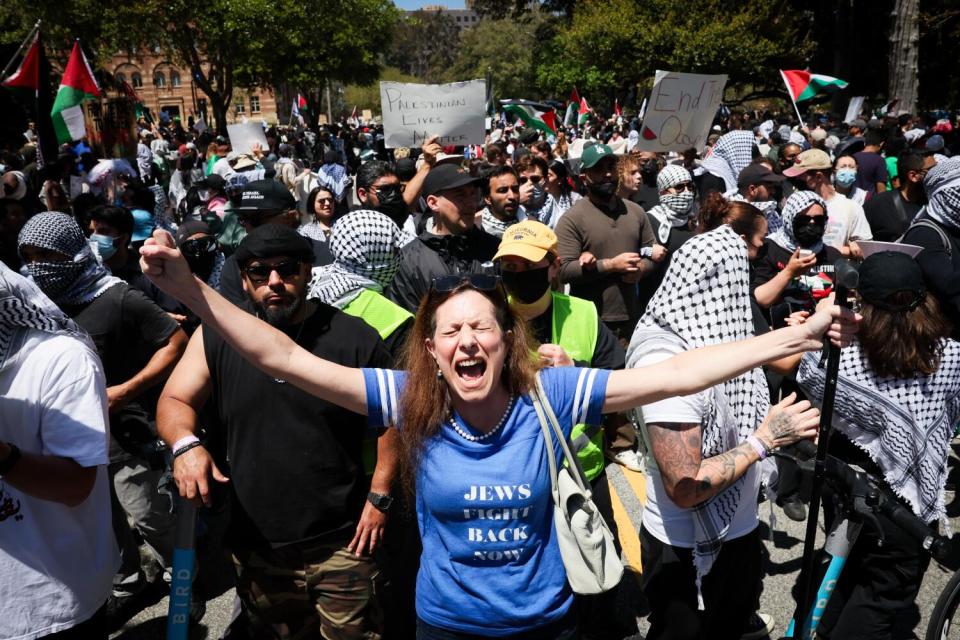 Johanna Israel, daughter of a long time UCLA professor, yells during a demonstration in support of