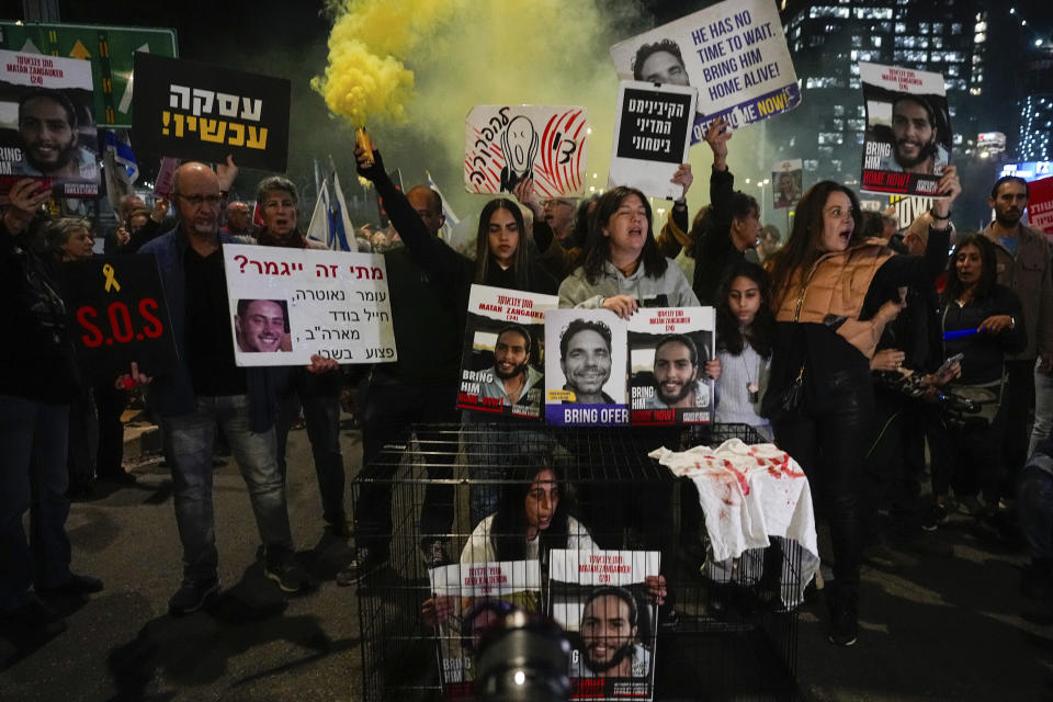 Relatives and supporters of the Israeli hostages held in the Gaza Strip by the Hamas militant group attend a rally calling for their release in Tel Aviv, Israel, Tuesday, March 26, 2024. (AP Photo/Ohad Zwigenberg)