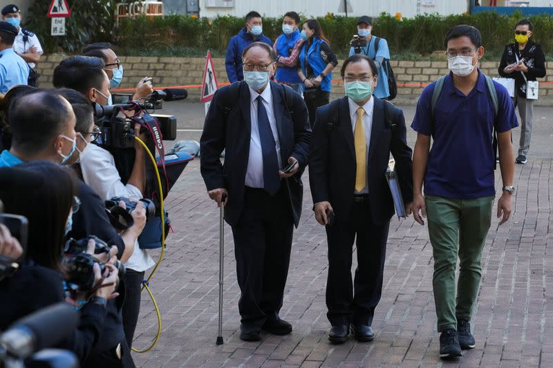 Sze Tak-Loy arrives at West Kowloon Magistrates' Courts building to take part in a hearing, in Hong Kong