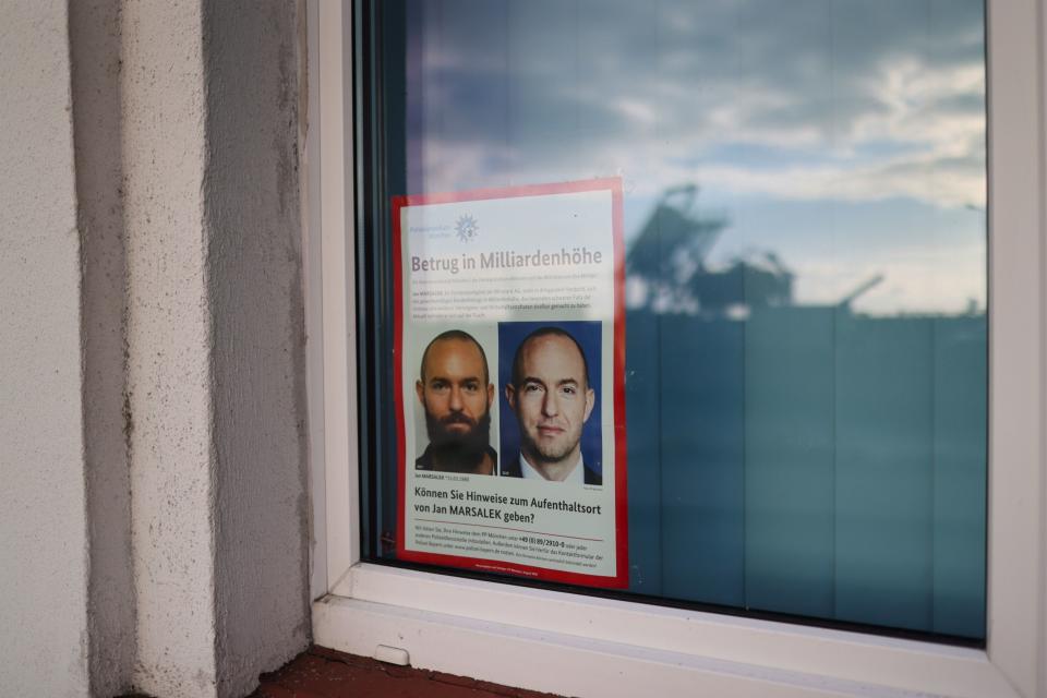 A wanted poster showing Jan Marsalek in the window of a marine police station in Sassnitz, Germany. (Alex Kraus/Bloomberg)