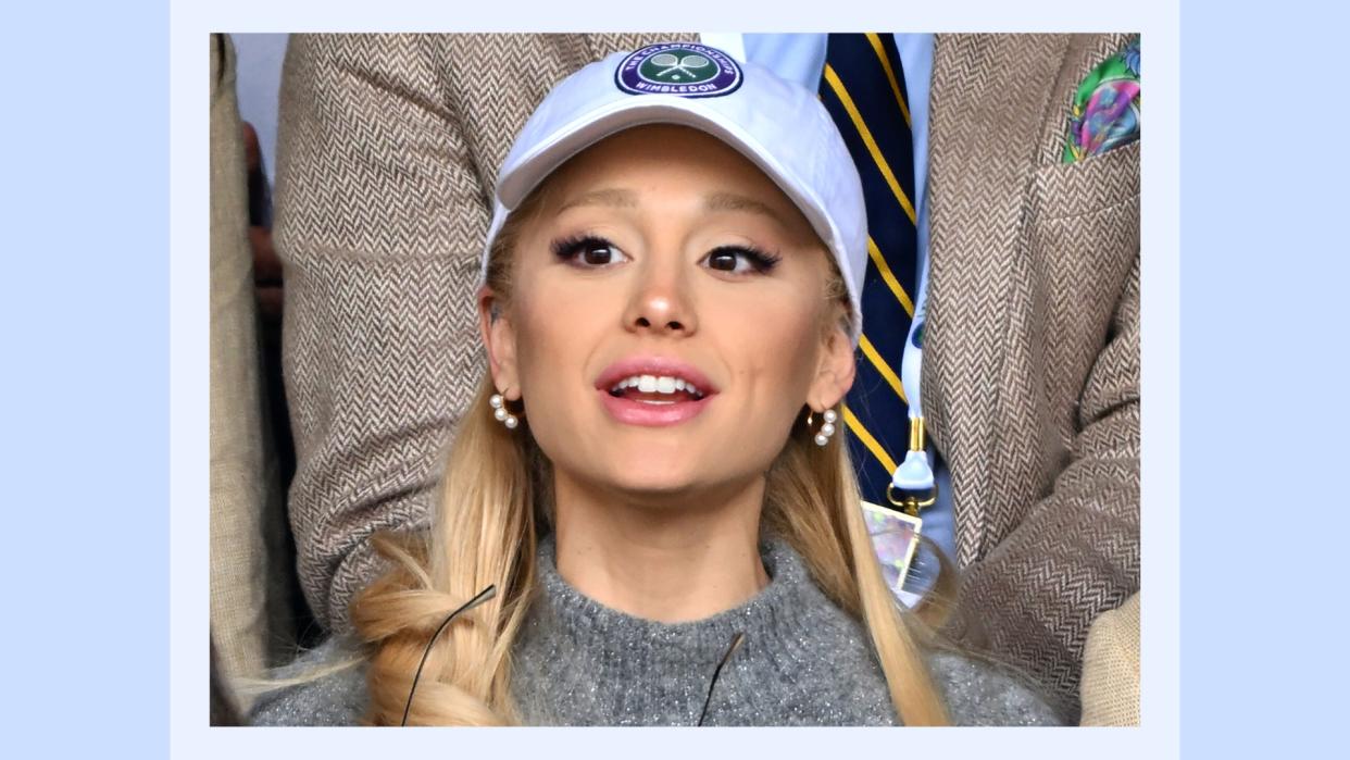  Ariana Grande watches Carlos Alcaraz vs Novak Djokovic in the Wimbledon 2023 men's final on Centre Court during day fourteen of the Wimbledon Tennis Championships at All England Lawn Tennis and Croquet Club on July 16, 2023 in London, England./ in a blue template 