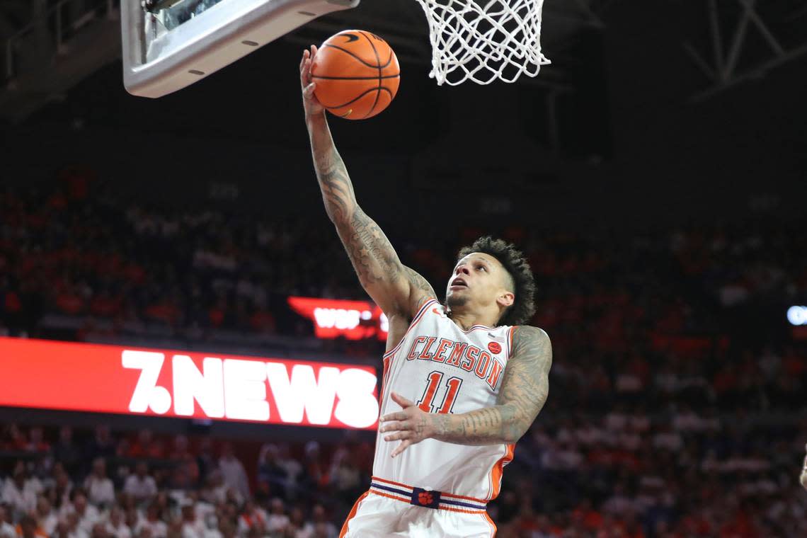 Clemson guard Brevin Galloway (11) makes a layup during the second half of an NCAA college basketball game against Duke in Clemson, S.C., Saturday, Jan. 14, 2023. (AP Photo/Artie Walker Jr.)