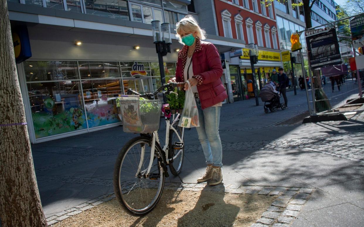 Shoppers out and about in Berlin as the German economy moves out of partial lockdown from the Corona Virus. Wlimersdorfer Strasse, Charlottenburg. -  Craig Stennett for the Telegraph