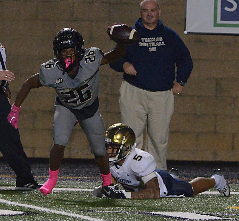 Gaffney played Spartanburg in high school football at Gaffney High School on Oct. 7, 2022.  Spartanburg's Que Moore (5) WR fights Gaffney's Jayden Sims (26) for the ball on a key play.  Gaffney's Jayden Sims (26) would pick the ball off on this key play. 