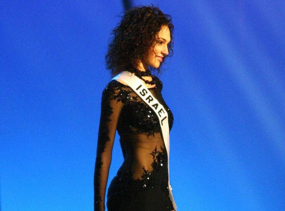 <p>7. After graduating high school, and before her compulsory service in the Israeli armed forces, her mom talked her into competing in the 2004 Miss Israel pageant. "I got in and I never thought I would win and then I won and then it scared me," she told <em><a href="https://www.youtube.com/watch?v=ituTGKo986A" rel="nofollow noopener" target="_blank" data-ylk="slk:W Magazine;elm:context_link;itc:0;sec:content-canvas" class="link ">W Magazine</a></em> in 2017. "I was like, 'What? Miss Israel? All the responsibility of being Miss Israel?'"</p>
