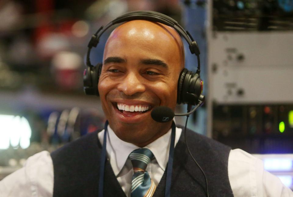 Jan 29, 2014; New York, NY, USA; NFL former running back Tiki Barber is interviewed on radio row in preparation for Super Bowl XLVIII at the Sheraton Times Square. Mandatory Credit: Jerry Lai-USA TODAY Sports