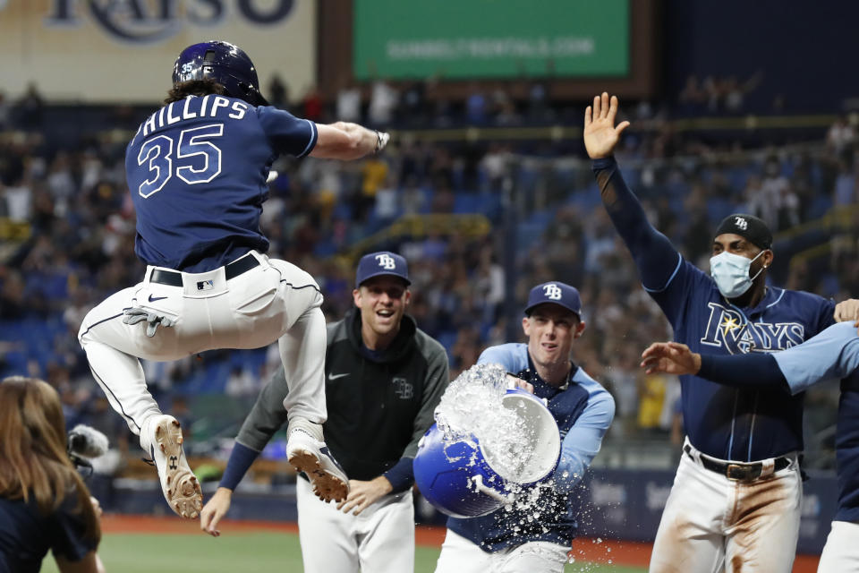 Phillips homers in 10th as Rays rally to beat Tigers 7-4